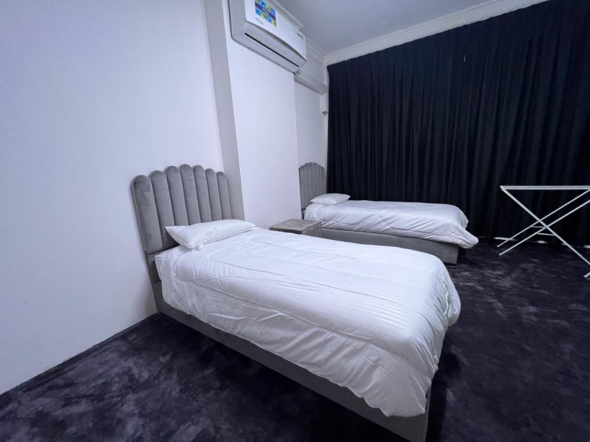 Dinar - Twin Bed Homestay